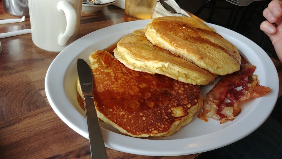 Breakfast plate with pancakes and home fries